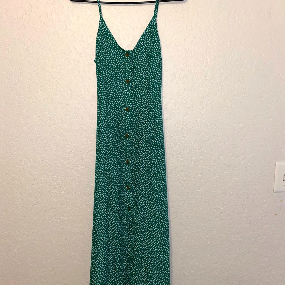 Sienna Sky Flower Green Dress with front wood colored buttons.
